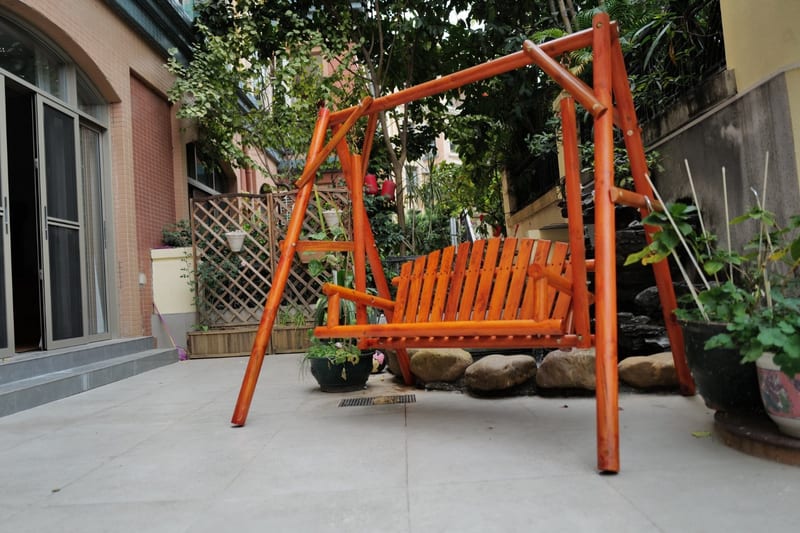 Mango Wood Outdoor Swing Chair in Orange Brown
