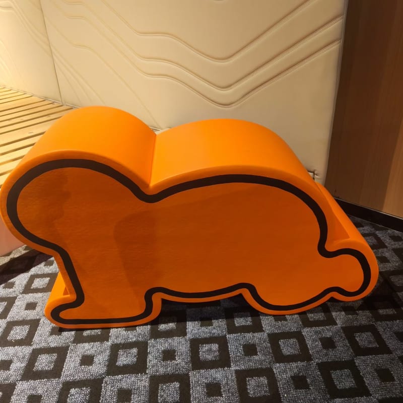 Figure-Shaped Upholstered Stool, Orange Faux Leather